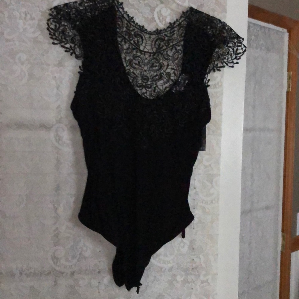 Lipsy one- piece body-suit with matching slacks.